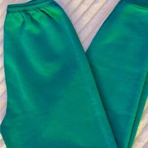 4 Hanes Women's Track Pants in Green, Red, Orange, and Pink